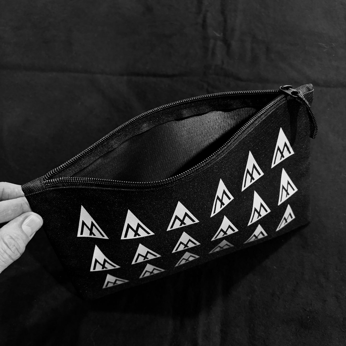 Zipcase with multiple M logos